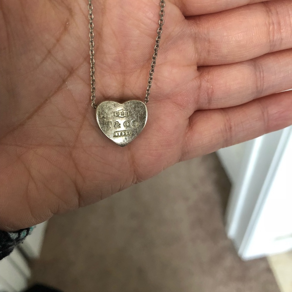 Tiffany’s necklace and charm